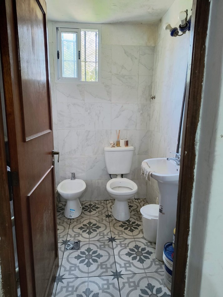 CASA CON PILETA BARRIO PERUZOTTI